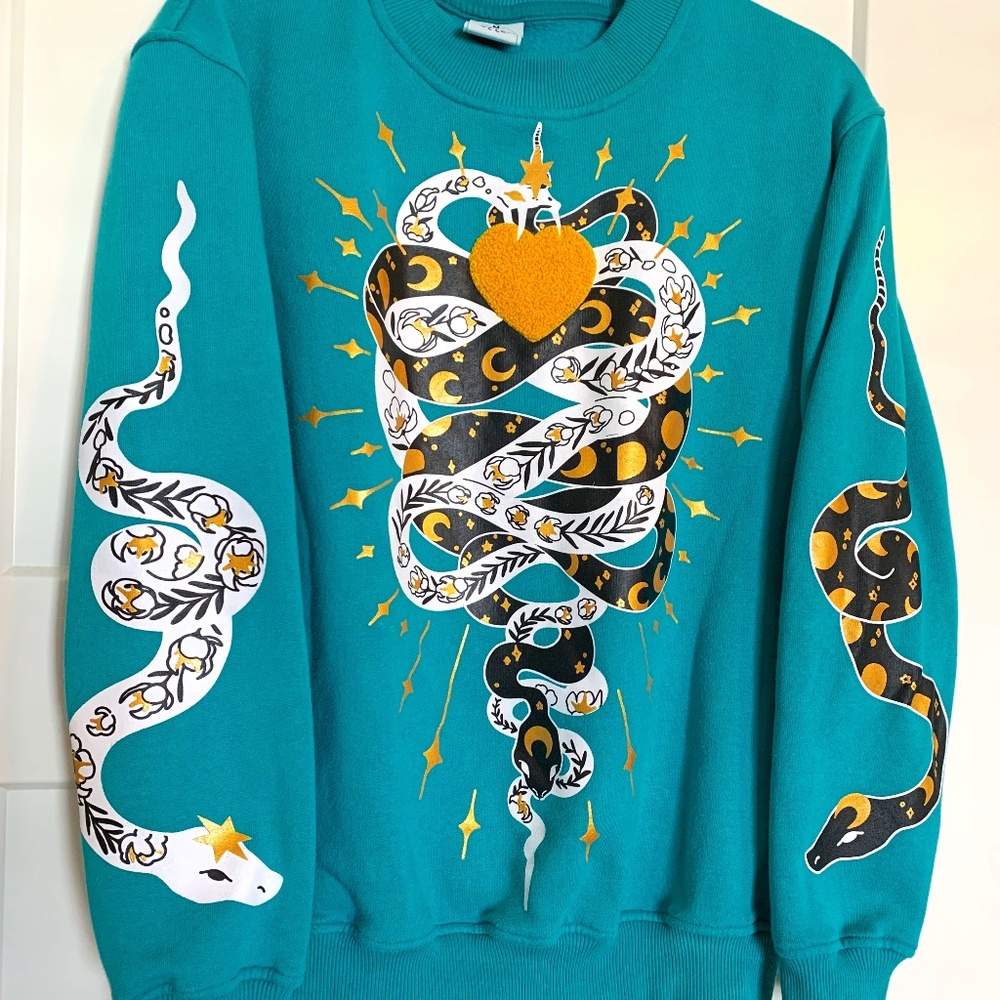 Snowlattes Garden's Apple Sweatshirt in Green